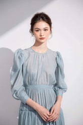 Tiered long-sleeve midi dress in sheer organza with gathered waist and puffed shoulder detail